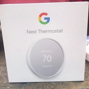New in Box. Never used Google Nest Thermostat. White